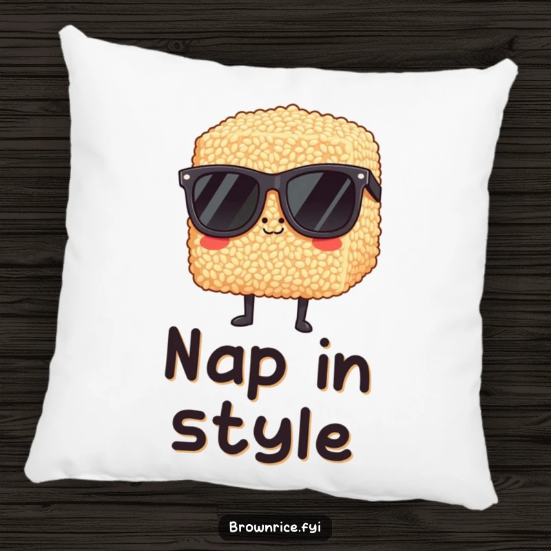 Funny brown rice block wearing oversized sunglasses, looking impossibly cool on a soft, decorative pillow.