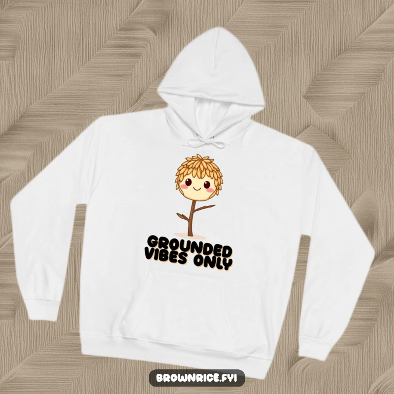 Funny smiling brown rice grain balancing on a tiny twig, depicted on a warm and cozy hoodie.