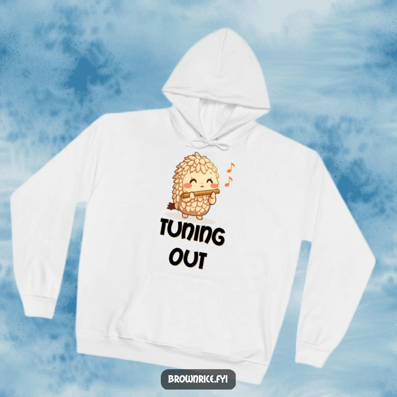 Funny Brown Rice Hoodie with a happy brown rice character skillfully playing a miniature flute, exuding musical merriment.