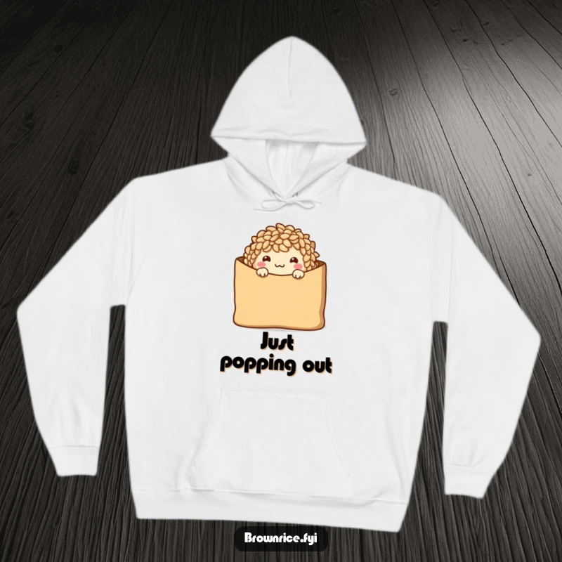Funny Hoodie showcasing a shy brown rice character peeking from a brown paper bag with a warm smile.
