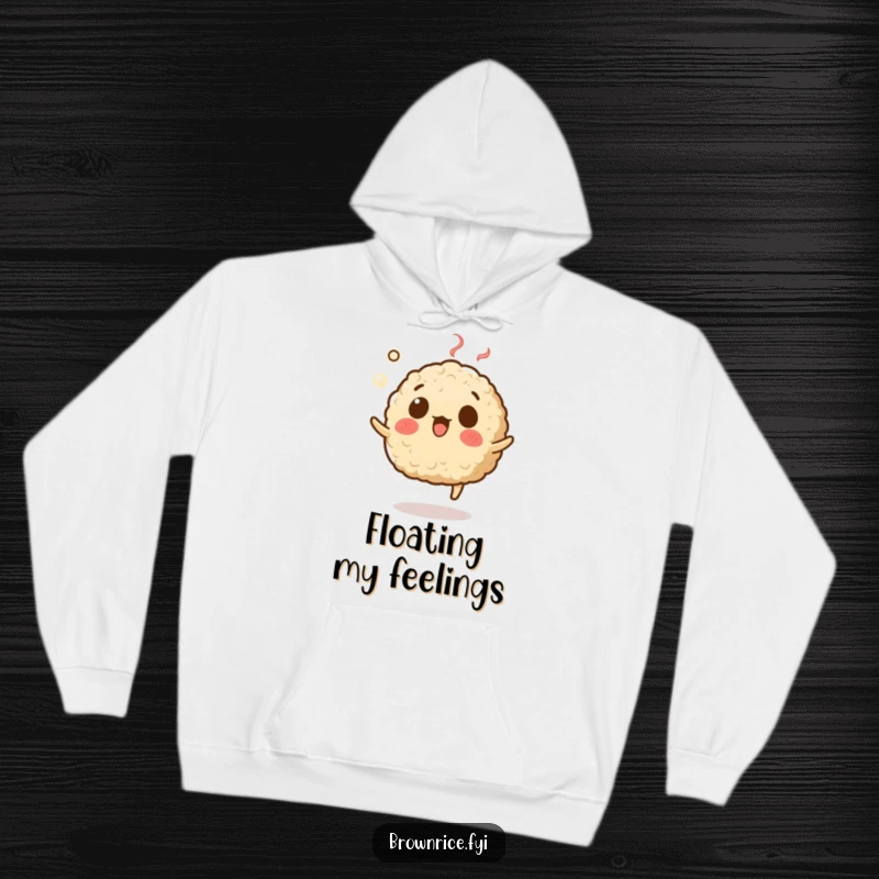 Funny, warm hoodie featuring a brown rice grain character with a surprised expression, levitating with steam, designed for comfort and humor.