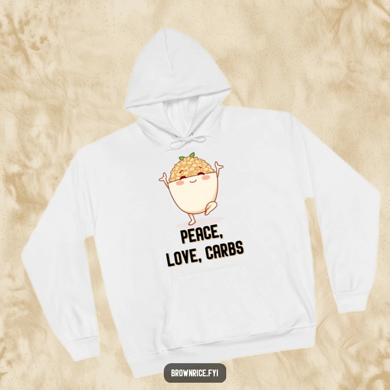 Funny hoodie with a smiling brown rice bowl character in a serene yoga pose, promoting comfort and a sense of well-being.
